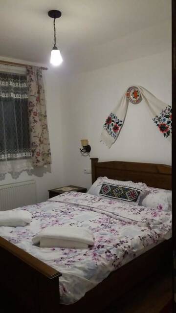 Фото номера Двухместный номер с 1 кроватью и видом на горы Лоджи Casa Dunca г. Сигету-Мармацией 10