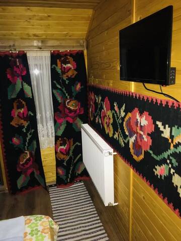 Фото номера Двухместный номер с 1 кроватью и видом на горы Лоджи Cabana Floare de Maramures г. Сигету-Мармацией 8