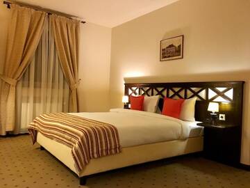 Фото номера Полулюкс Отель Hotel Gradina Morii г. Сигету-Мармацией 3